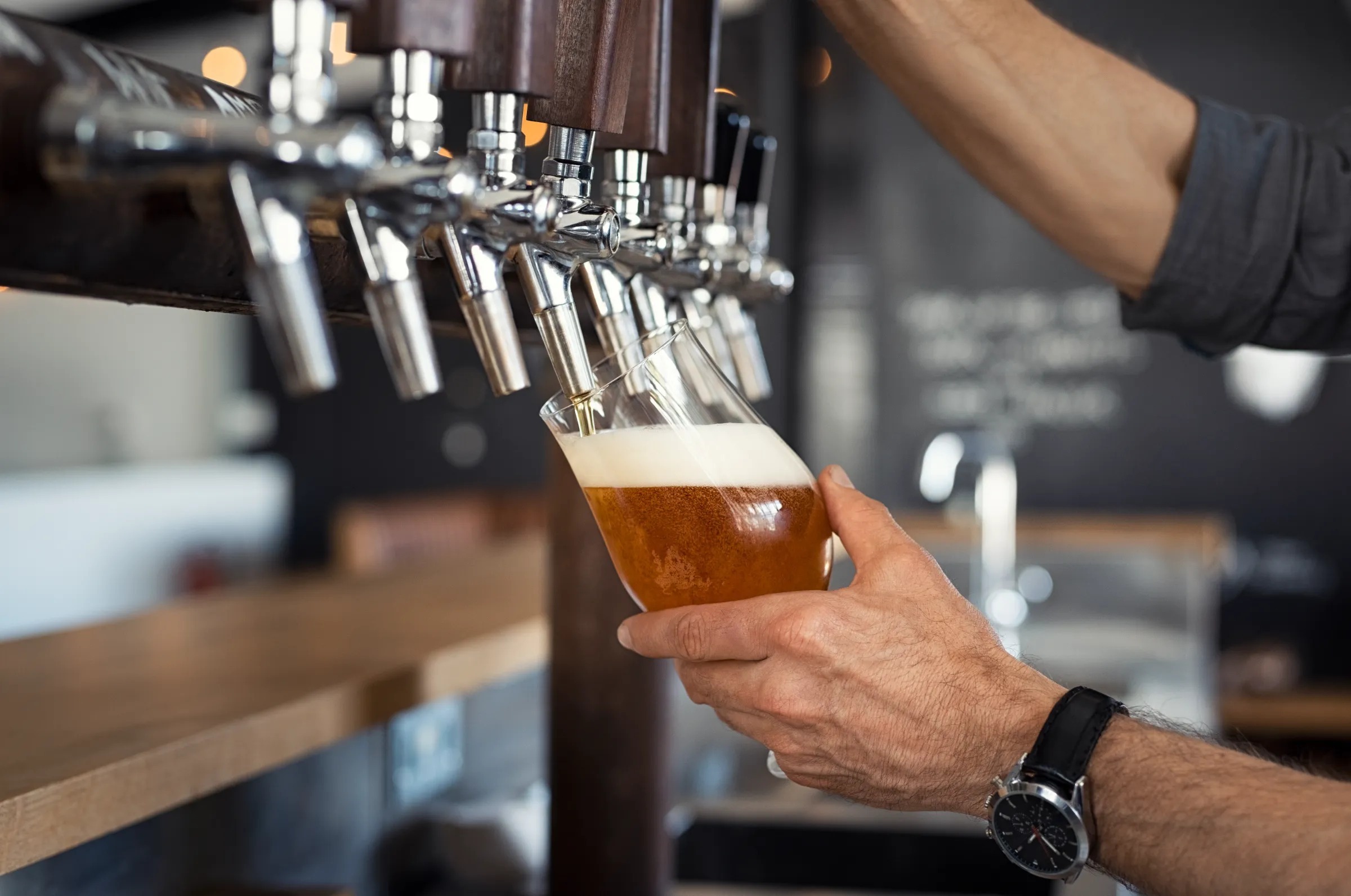 Bartender pouring beer